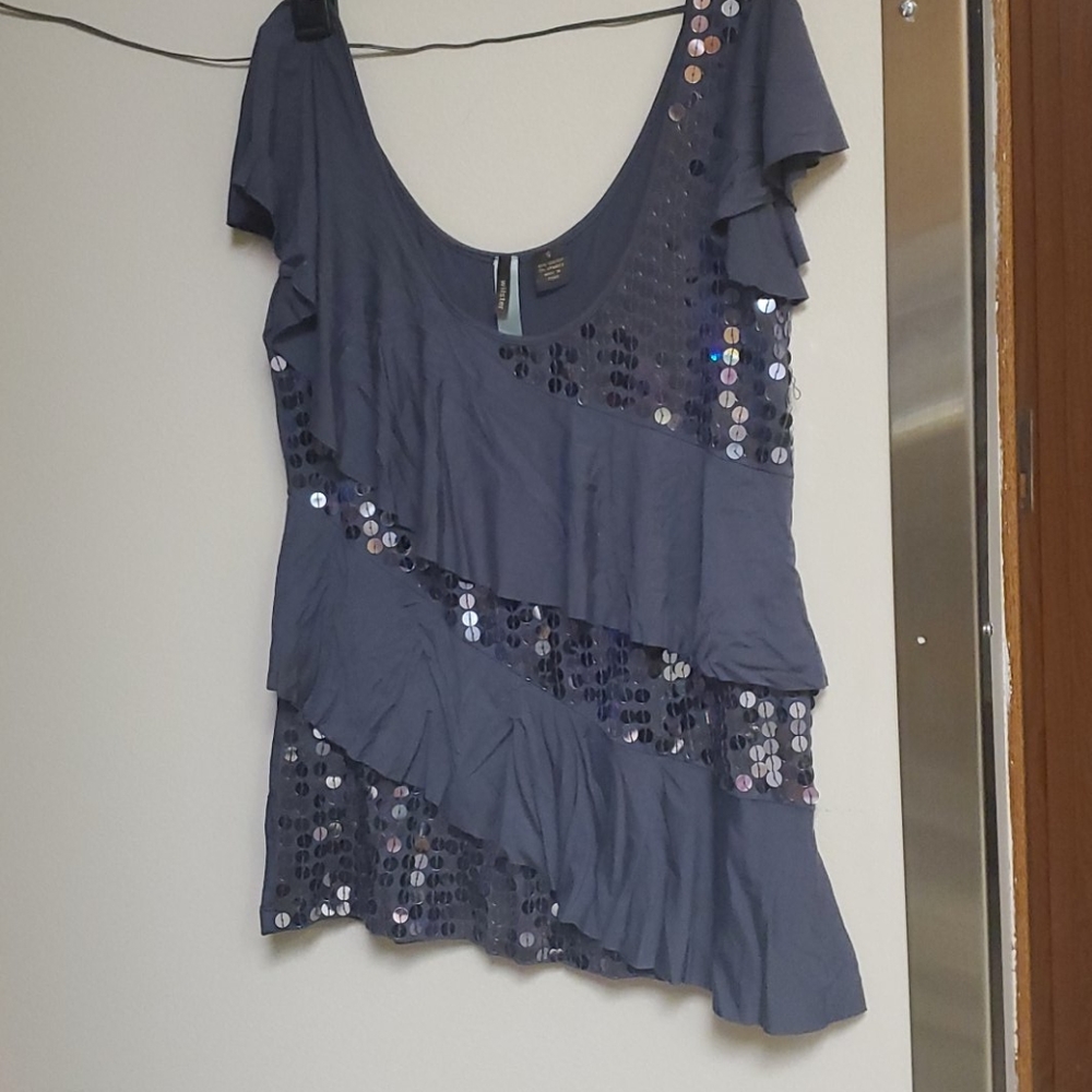 Blouse with capped sleeves,sequins and ruffles